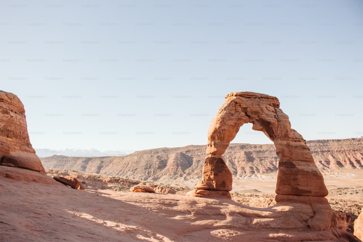 Scenic view of a natural sandstone arch in Utah